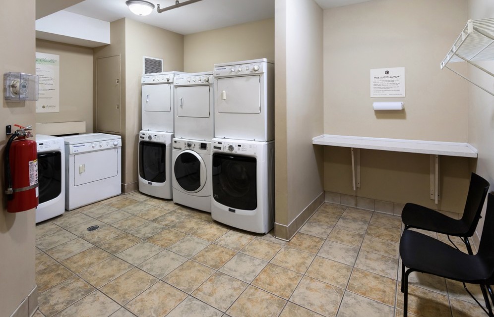 Guest Laundry with four sets of washers/dryers