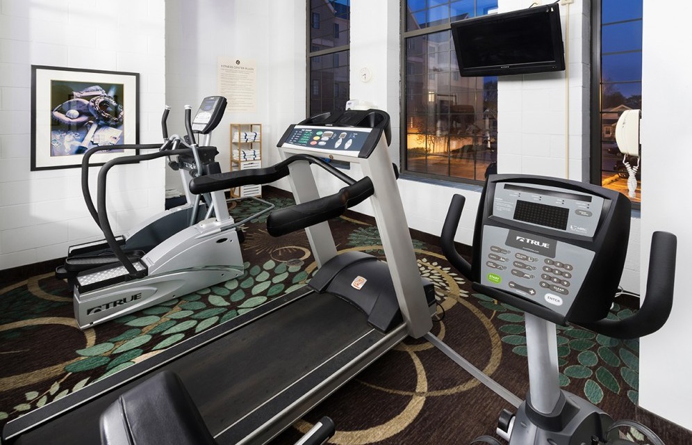Workout Room with elliptical, treadmill, and bike